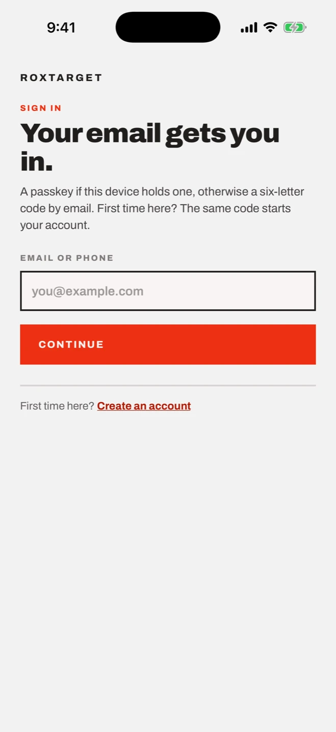 RoxTarget sign-in screen on iPhone: email or phone, with a passkey used when the device holds one